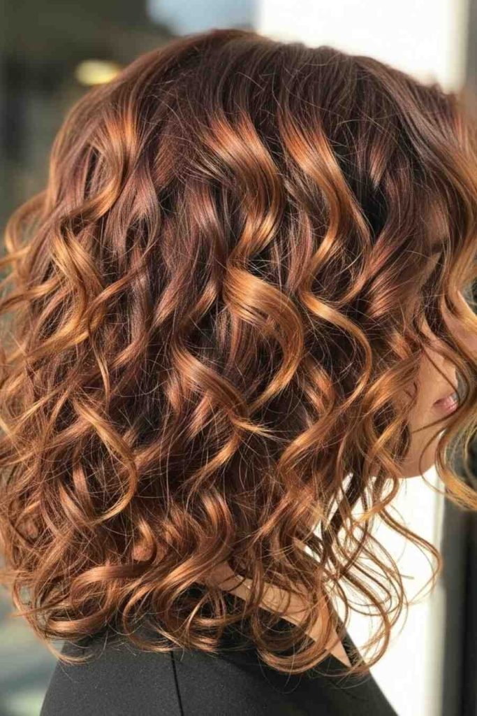 Cinnamon Highlights on Medium Curls